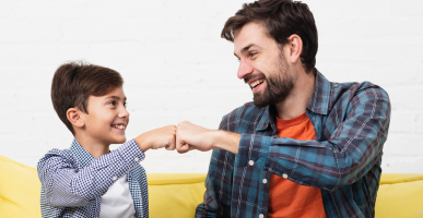 happy-father-son-hit-fists